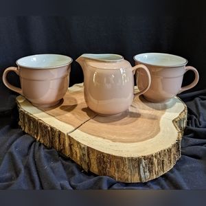 1 small cream pitcher and 2 cups.